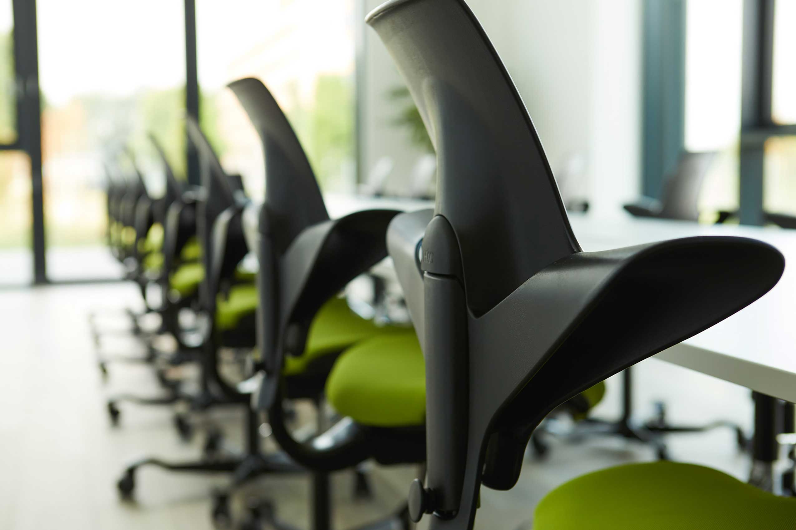 HÅG Capisco Puls chairs in open office space at Der Grüne Punkt office | Photo : Flokk