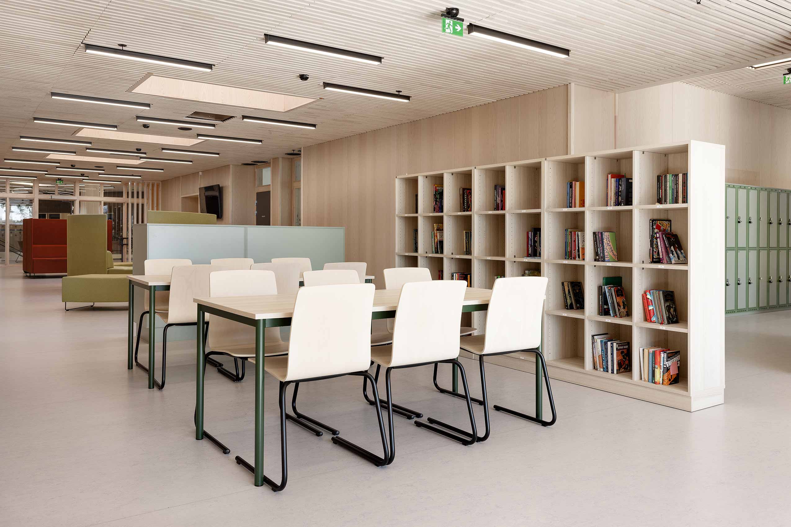 Profim Com chairs around tables in a school library area