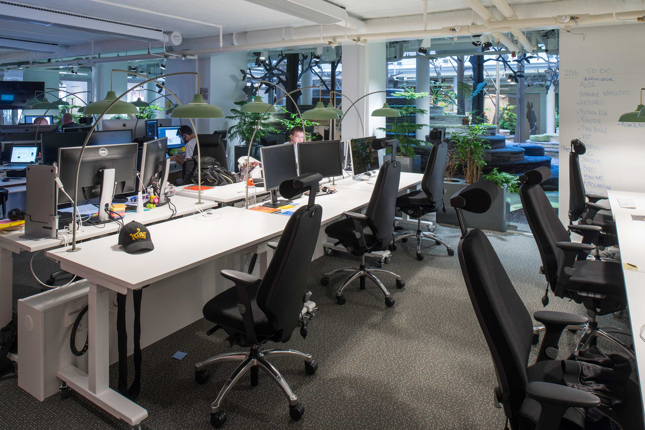 Angle 3 of office space in King's new office, featuring RH Logic chairs, with people working
