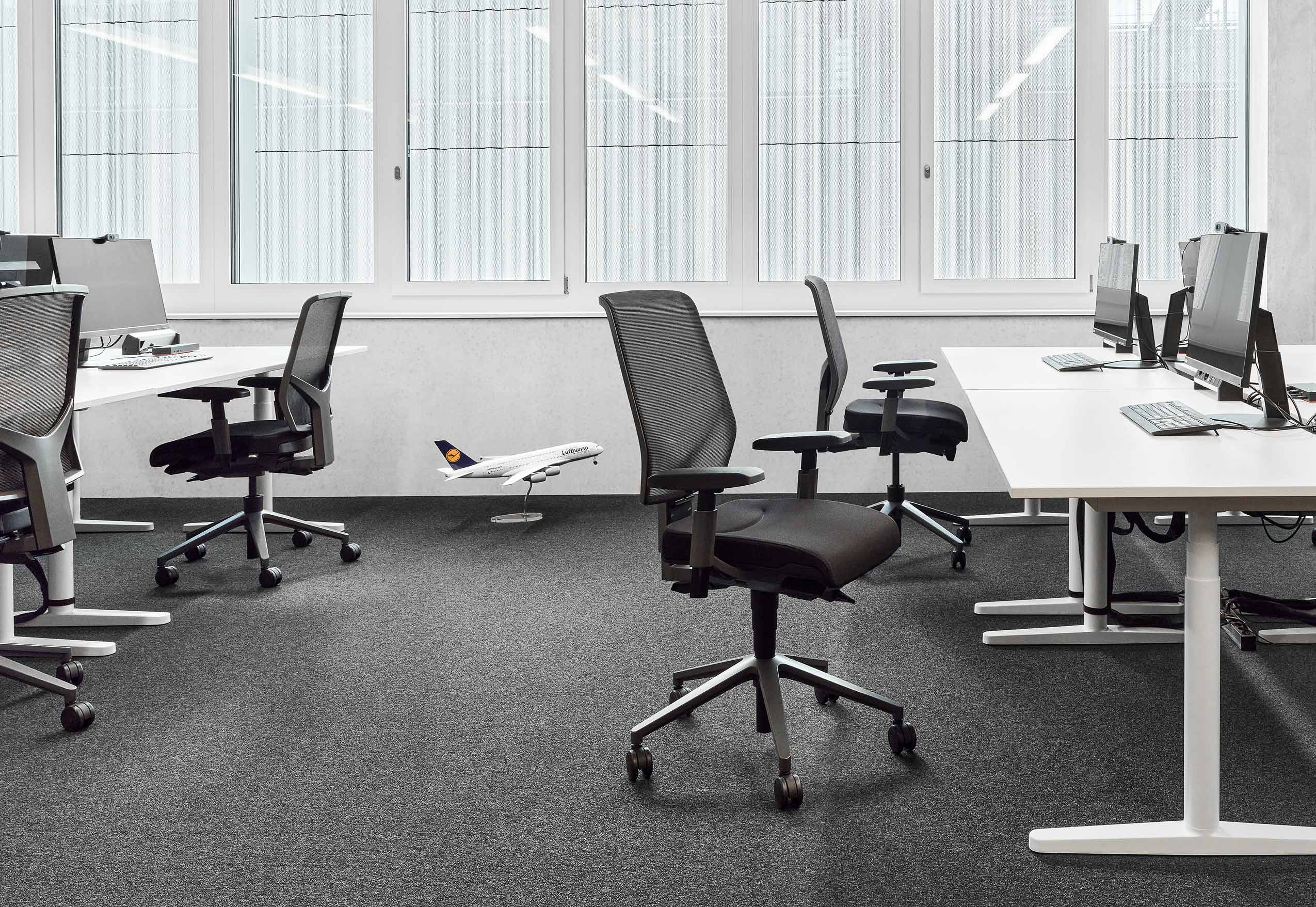 Lufthana's new office, featuring Giroflex 68 chairs in black at workstations