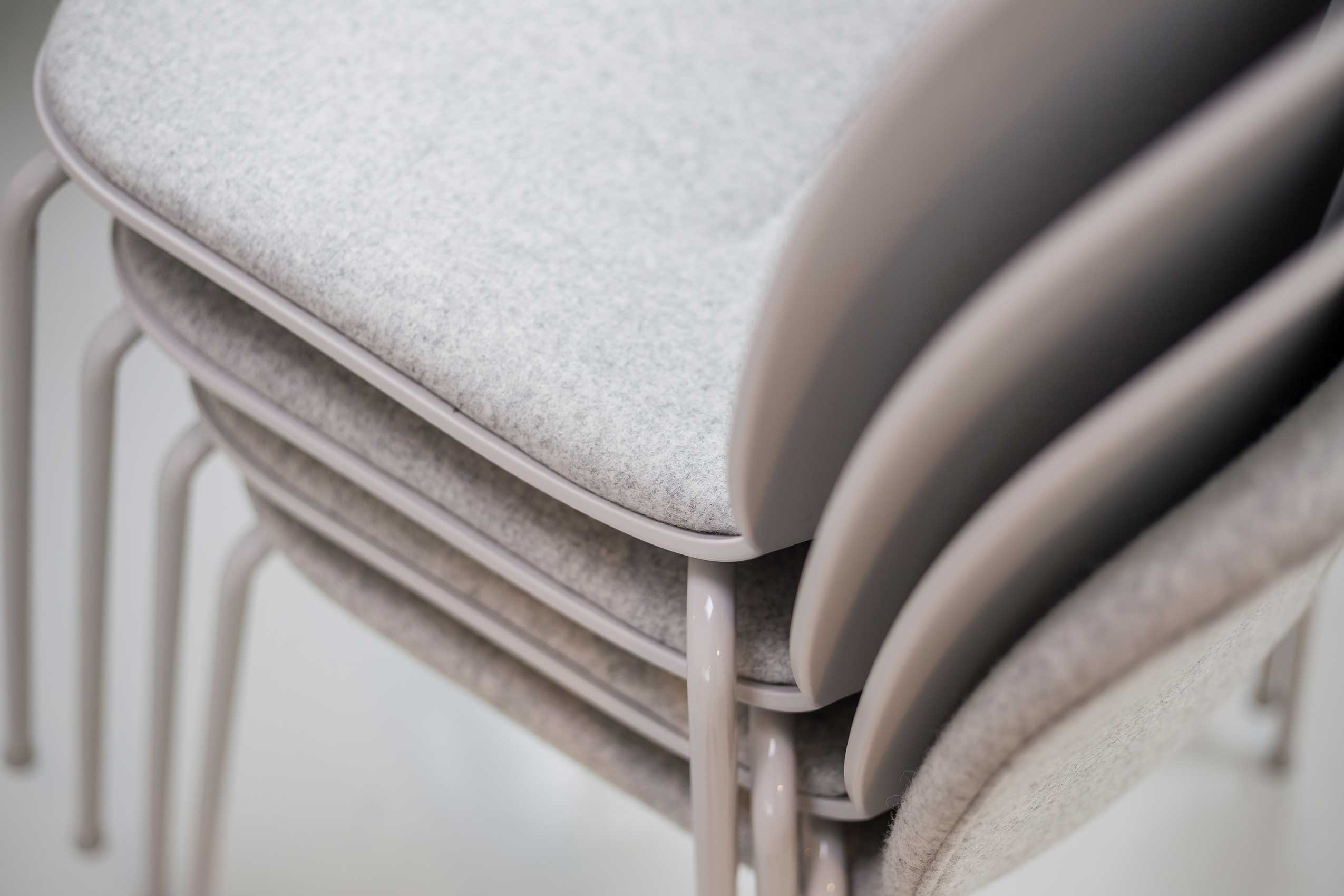 Close up of stacked Profim Noor chairs in Ruth Tomlinson Jewellery Atelier | Photo : Tom Seward